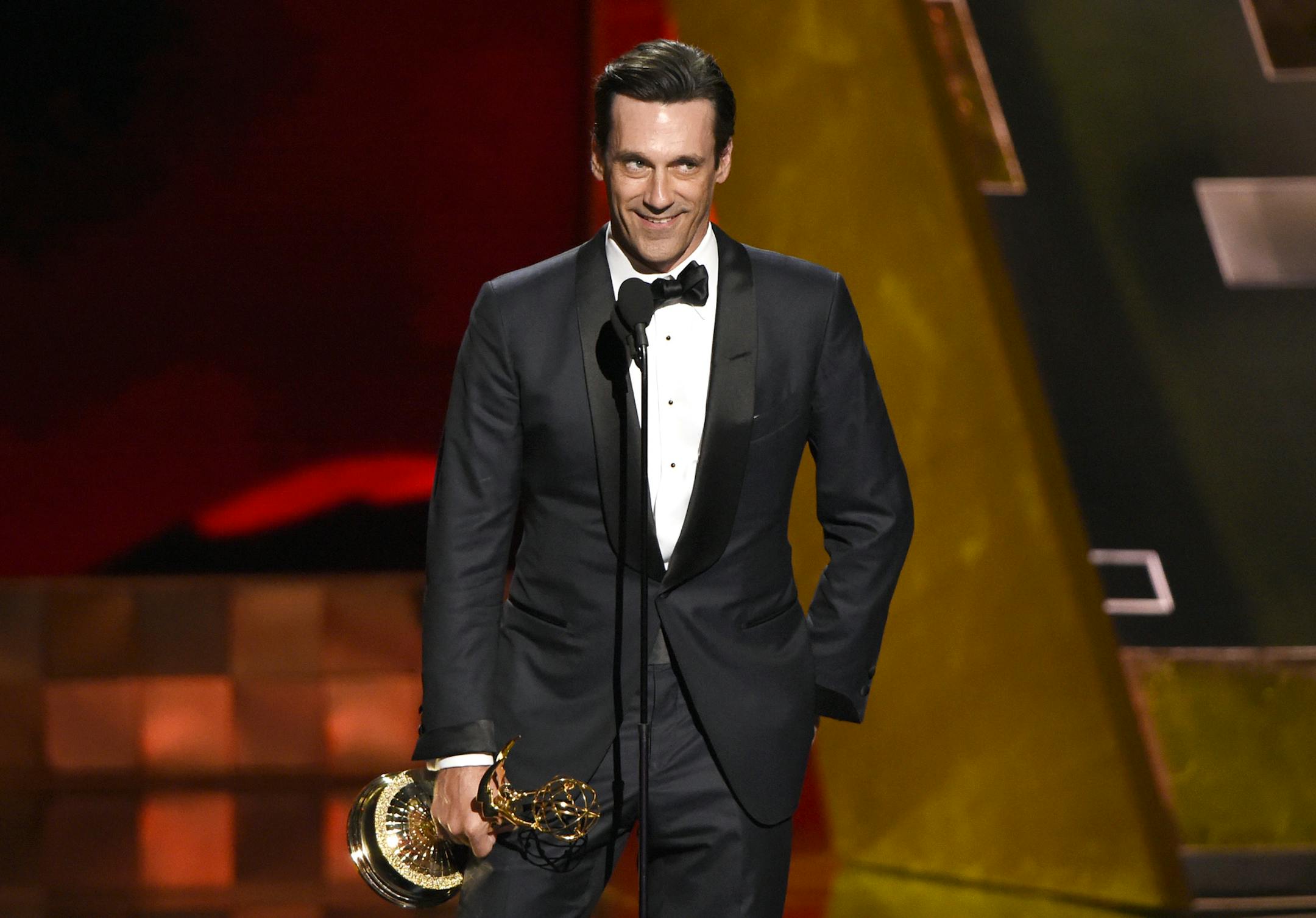 Jon Hamm accepts the award for outstanding lead actor in a drama series for &#xec;Mad Men&#xee; at the 67th Primetime Emmy Awards on Sunday, Sept. 20, 2015, at the Microsoft Theater in Los Angeles. (Photo by Chris Pizzello/Invision/AP) ORG XMIT: NYET721