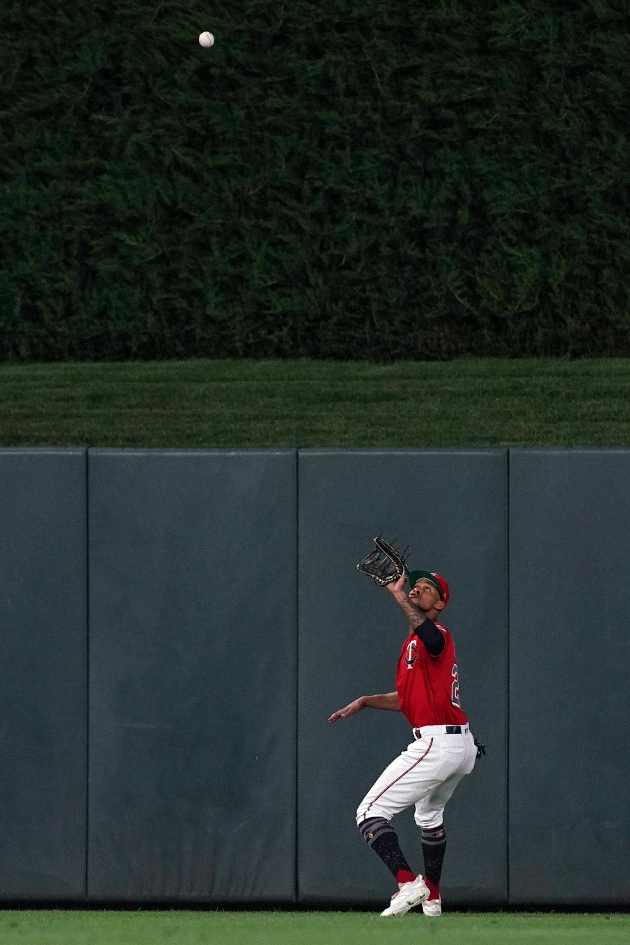 Minnesota Twins center fielder Byron Buxton (25) fielded a pop fly hit by Texas Rangers second baseman Rougned Odor (12) in the eighth inning.