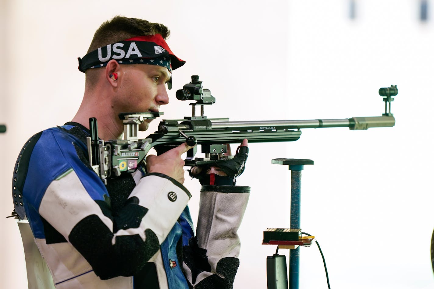 Patrick Sunderman, right, of the United States, competes in the men's 50-meter 3 positions rifle at the Asaka Shooting Range in the 2020 Summer Olympics, Monday, Aug. 2, 2021, in Tokyo, Japan. (AP Photo/Alex Brandon)