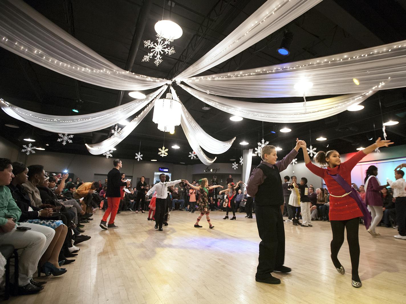 Tasia Davenport, 10, right, and Peyton Kramer, 10, compete in the Colors of the Rainbow Dancing Classrooms Team Match presented by Heart of Dance at Dancers Studio in St. Paul December 13, 2015. (Courtney Perry/Special to the Star Tribune)