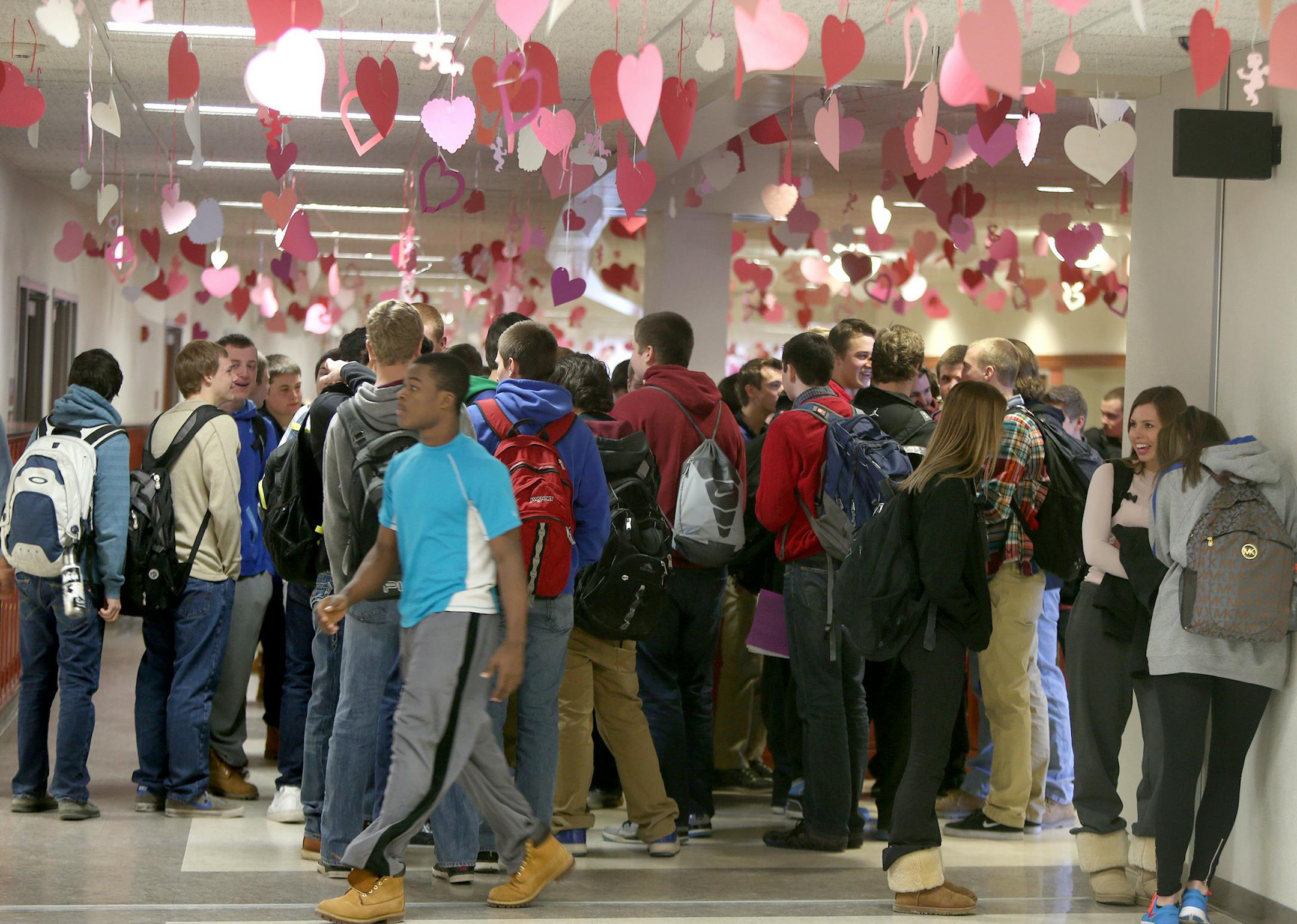 Wayzata High School students crowded a foyer as they waited for their lunch break, Monday, February 10, 2014 in Plymouth, MN. There is a $109 million proposed plan for Wayzata to ease overcrowding at most of its schools. The district will hold a referendum on February 25 to consider the plan, which, among other things, calls for an addition to be built at the high school and the construction of a new elementary. (ELIZABETH FLORES/STAR TRIBUNE) ELIZABETH FLORES • eflores@startribune.com