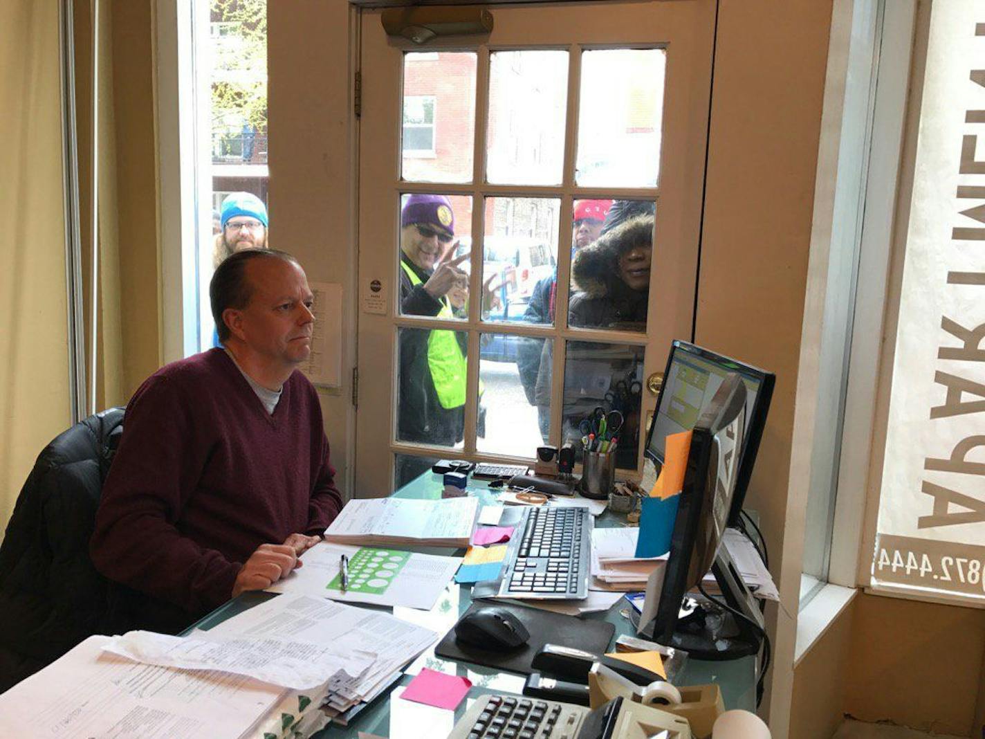 Protesters rallied in and out of the office of Minneapolis landlord Stephen Frenz on Monday in a demand for a three-year rent freeze and more repairs on his properties. "They have a right to be heard," Frenz said.