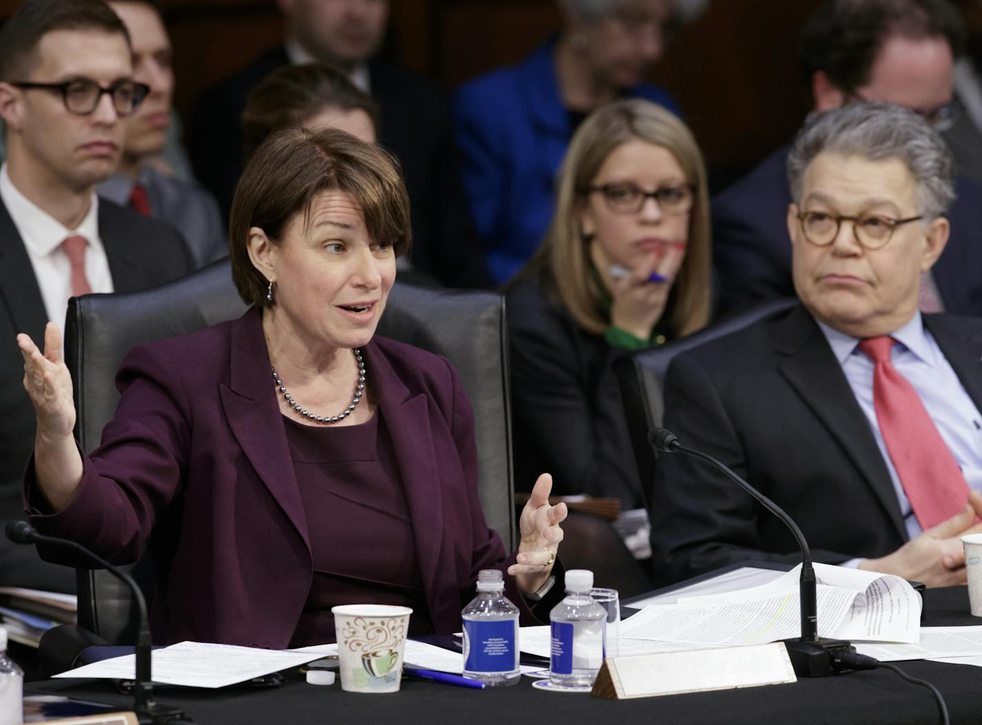 Democratic members of the Senate Judiciary Committee, Sen. Amy Klobuchar, D-Minn., and Sen. Al Franken, D-Minn., question the Republican side as the panel meets to advance the nomination of President Donald Trump's Supreme Court nominee Neil Gorsuch, Monday, April 3, 2017, on Capitol Hill in Washington. (AP Photo/J. Scott Applewhite)