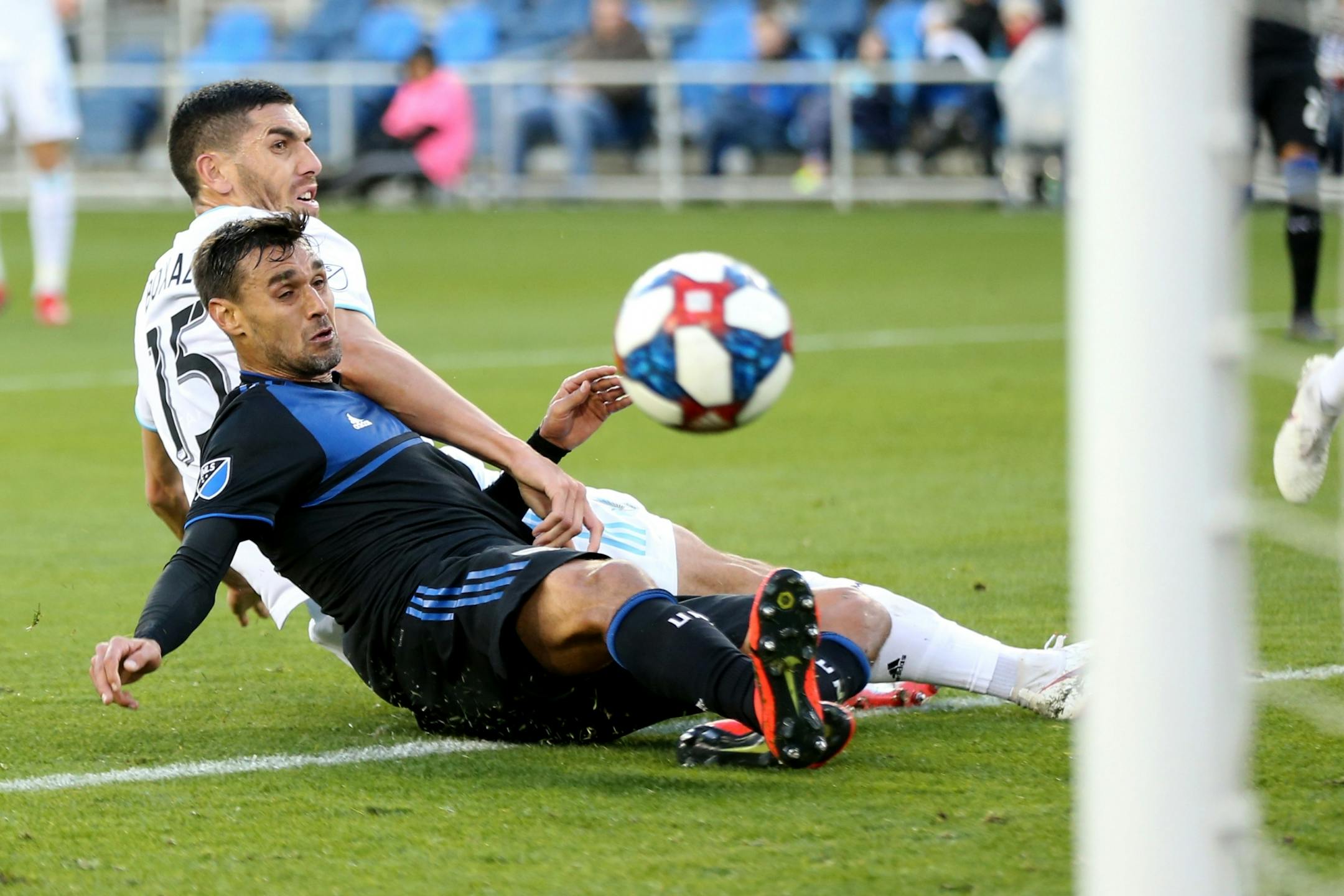 SAN JOSE, CALIFORNIA - MARCH 9: San Jose Earthquakes' Chris Wondolowski (8) attempts to score against Minnesota United's Michael Boxall (15) during the first half of a MLB game at Avaya Stadium in San Jose, Calif., on Saturday, March 9, 2019.
