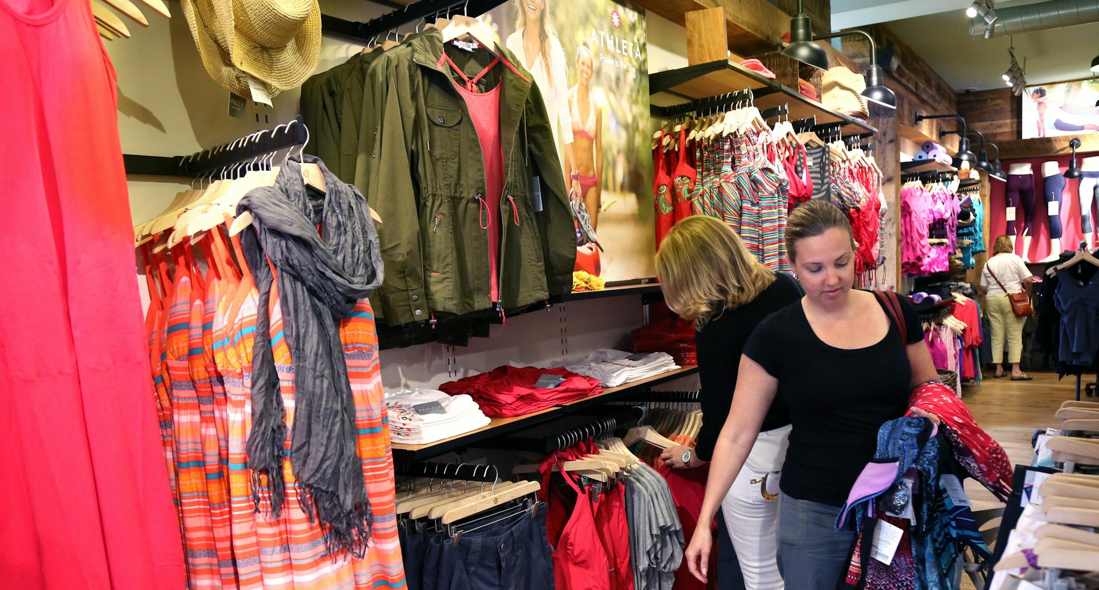 Krista Roering, St Louis Park, shopped the sale of the Athleta store in Edina. ] TOM WALLACE ‚Ä¢ twallace@startribune.com SLUG/SAXO #214073 FITNESS061513 ASSIGNMENT #20029489A EXTRA INFORMATION: The Athleta store in Edina for trending workout clothes and how they have become upscale, and yet everyday dress styles.