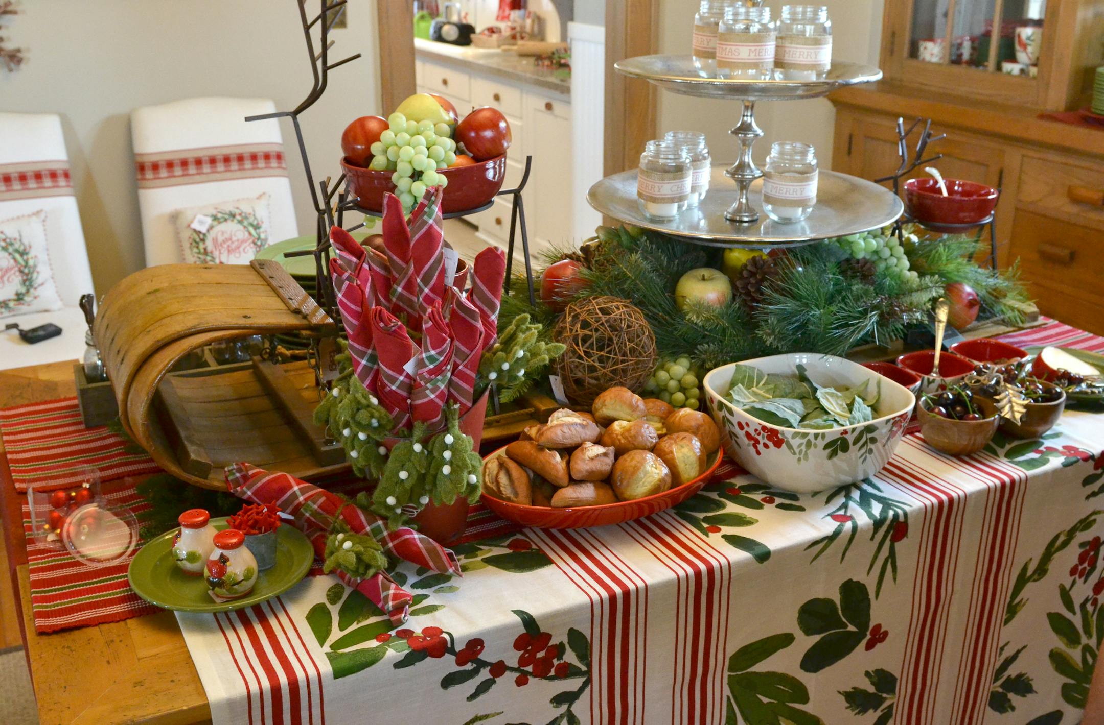 A wooden sled serves as the centerpiece in the dining room of the Bachman's Holiday Ideas House, open through Dec. 13.