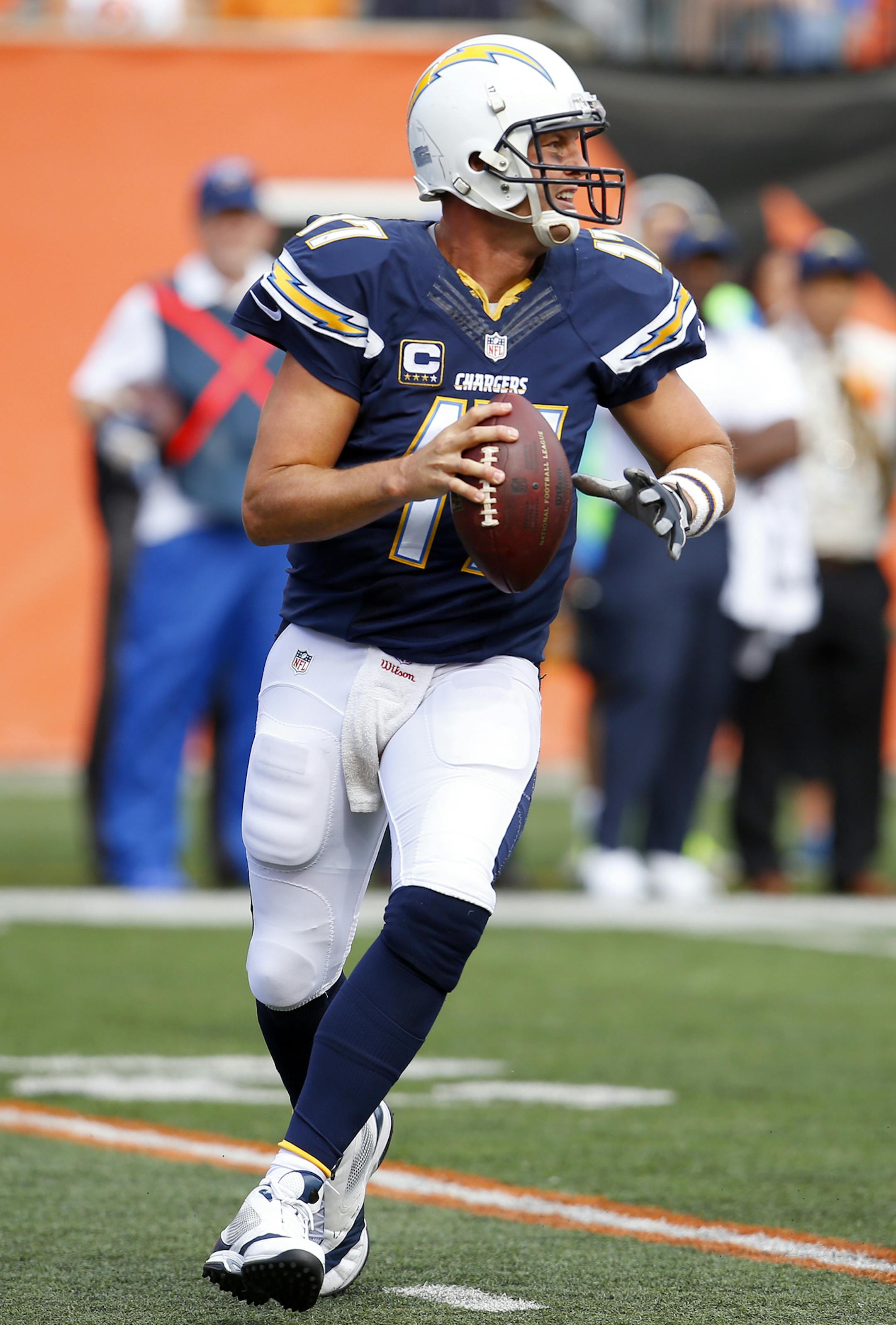 San Diego Chargers quarterback Philip Rivers (17) looks to throw a pass during an NFL football game against the Cincinnati Bengals in Cincinnati, Sunday, Sept. 20, 2015. (Jeff Haynes/AP Images for Panini) ORG XMIT: MIN2015092516073984