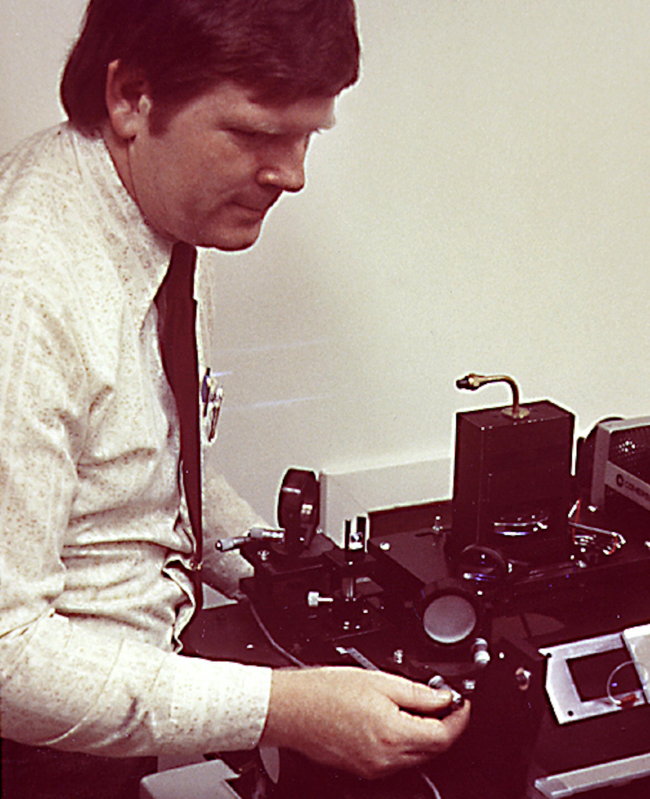 In an undated image provided by Xerox, Gary Starkweather, the inventor of the laser printer, with an early model in the 1970s. Starkweather, part of Xerox's Palo Alto Research Center, or PARC, the crucible for some of the most important digital technologies of the computer age, died in Orlando on Dec. 26, 2019. He was 81. (Xerox PARC via The New York Times) -- NO SALES; FOR EDITORIAL USE ONLY WITH OBIT-STARKWEATHER BY METZ FOR JAN. 15, 2020. ALL OTHER USE PROHIBITED. --