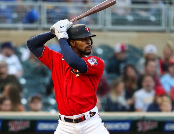Byron Buxton of the Twins takes his at-bat against the Brewers in the first inning Friday.