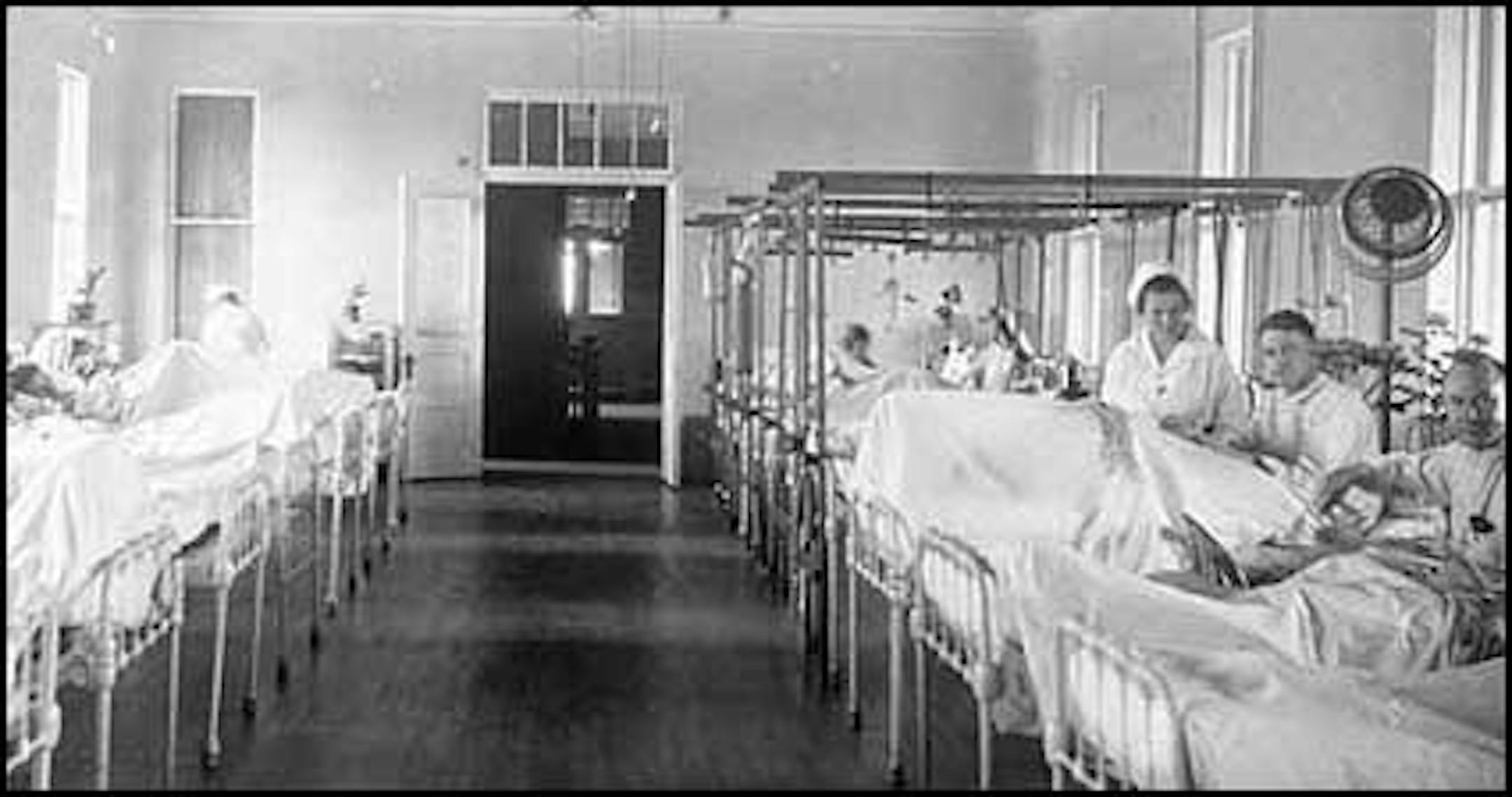 The outbreak of Spanish flu hit soldiers stationed at Fort Snelling before spreading to civilians. This photo, taken about 1918, shows a surgical ward at the base hospital. (Photo courtesy mnhs.org)
