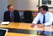 Scott Gillespie, left, talks with Wisconsin Gov. Scott Walker, who met with the Star Tribune Editorial Board on Dec. 13, 2012