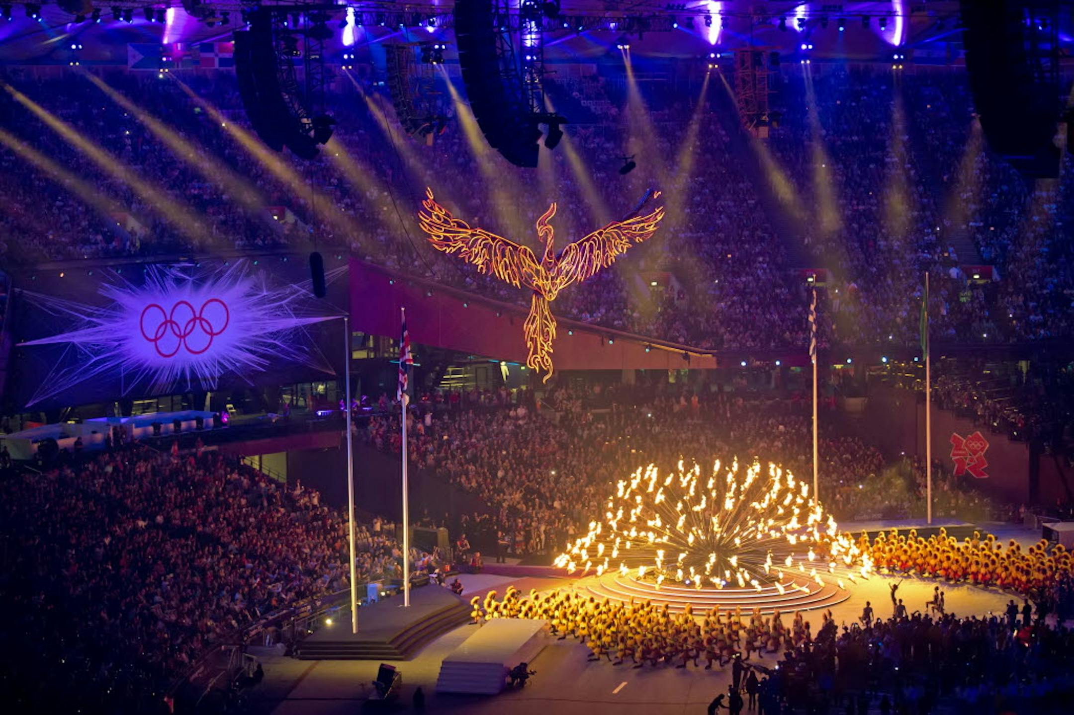 Britain bade farewell as only it could: Olympic Stadium lit up with music legends and 80,000 people whistling to a Monty Python tune.
