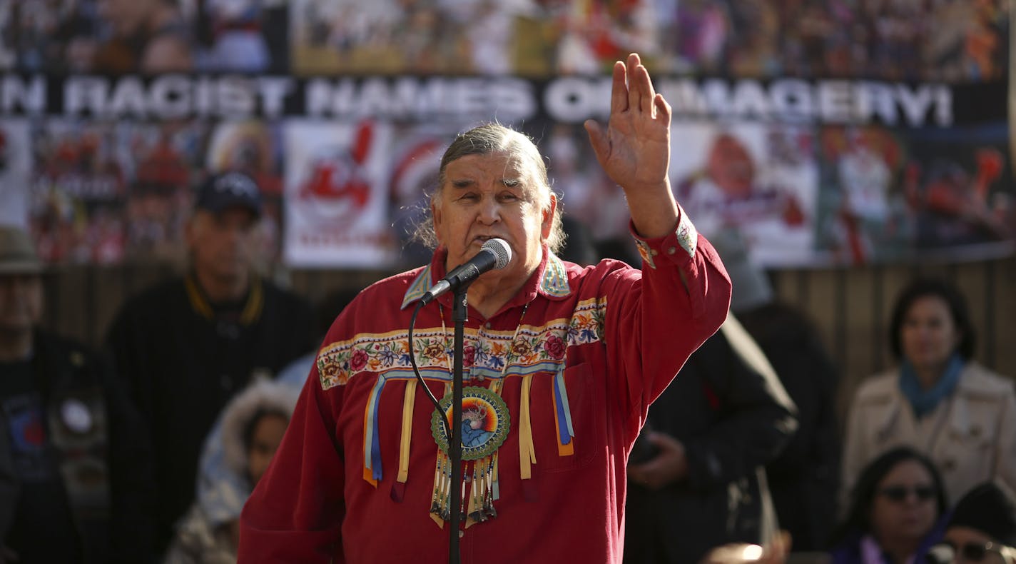 Longtime Native American activist and AIM co-founder Clyde Bellecourt spoke to the crowd gathered for the rally outside TCF Bank Stadium Sunday morning before the Vikings game. ] JEFF WHEELER &#x201a;&#xc4;&#xa2; jeff.wheeler@startribune.com A rally to protest the name of the Washington Redskins football club was held at TCF Bank Stadium before Sunday's Vikings game against the team from Washington on November 2, 2014.