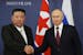 FILE - Russian President Vladimir Putin, right, and North Korea's leader Kim Jong Un shake hands during their meeting at the Vostochny cosmodrome outs