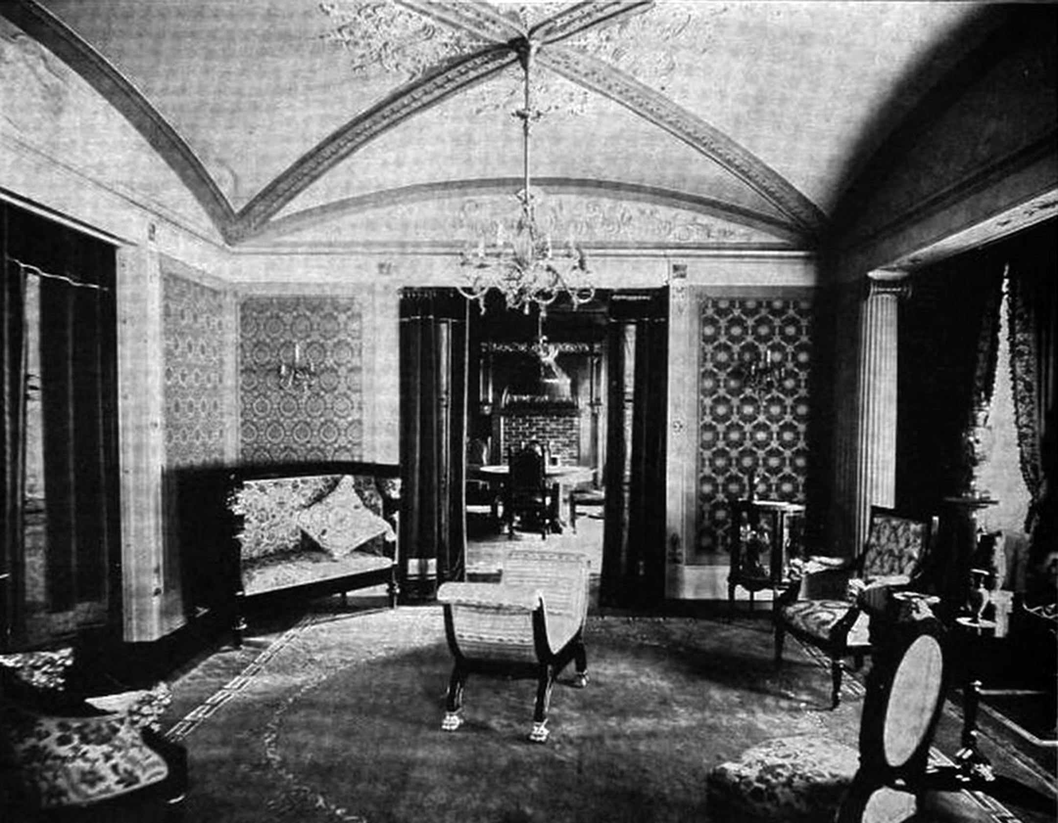 A vintage photo of a sitting room.