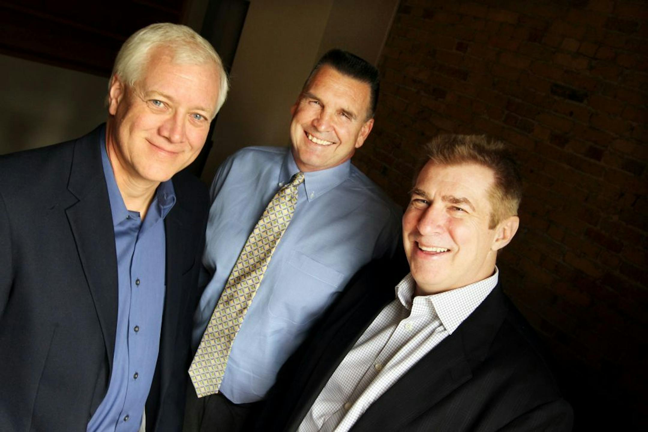 Left to right, co-founder, president and CEO Jon Otterstatter, Medical Innovation Officer Dr. Drew Palin, and SVP of marketing Michael Emerson discuss the BodyGuardian Remote Monitoring System at Preventice in Minneapolis September 13, 2012.