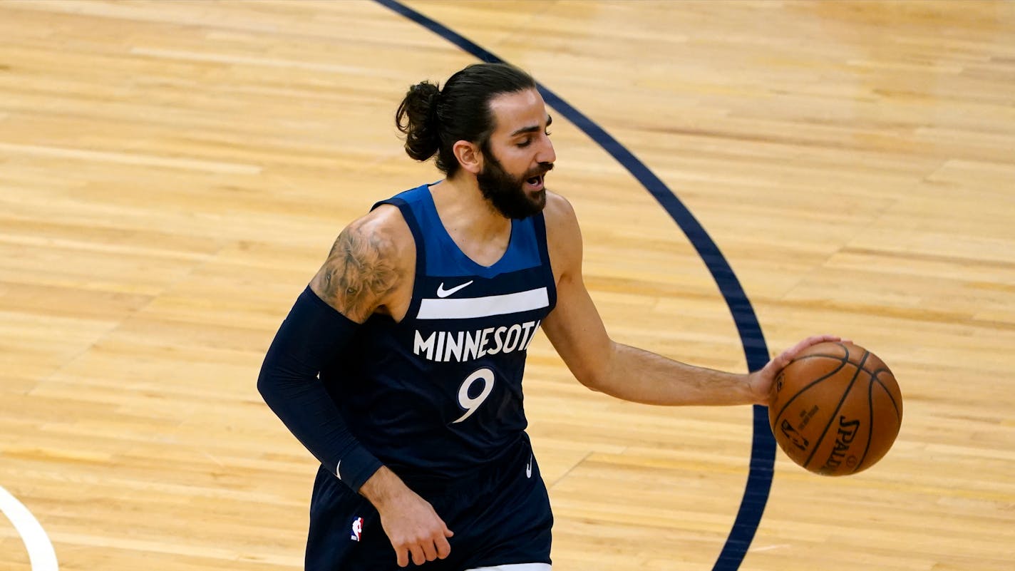 Minnesota Timberwolves' Ricky Rubio (9) plays in an NBA basketball game against the Cleveland Cavaliers, Sunday, Jan. 31, 2021, in Minneapolis. (AP Photo/Jim Mone)