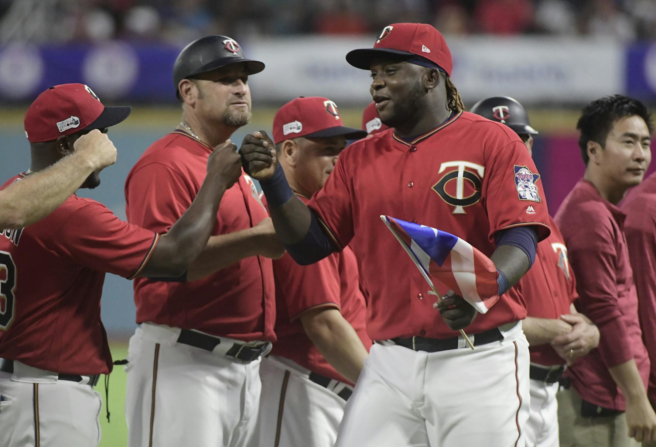 Minnesota Twins infielder Miguel Sano enters the field moments before game one of a two-game MLB Series against the Cincinnati Indians at Hiram Bithorn Stadium in San Juan, Puerto Rico, Tuesday, April 17, 2018. (AP Photo/Carlos Giusti)