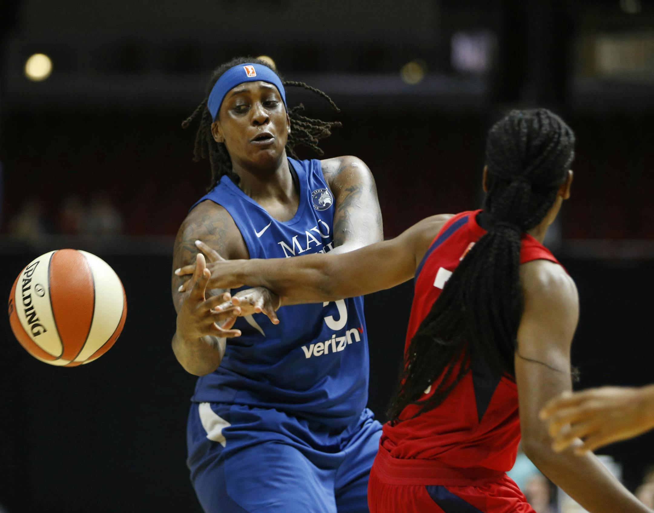 Lynx forward Lynetta Kizer (5) gets the ball knocked away by Mystics guard Ariel Atkins (7) Sunday, May 6, 2018, during their WNBA preseason game at Wells Fargo Arena in Des Moines, Iowa.