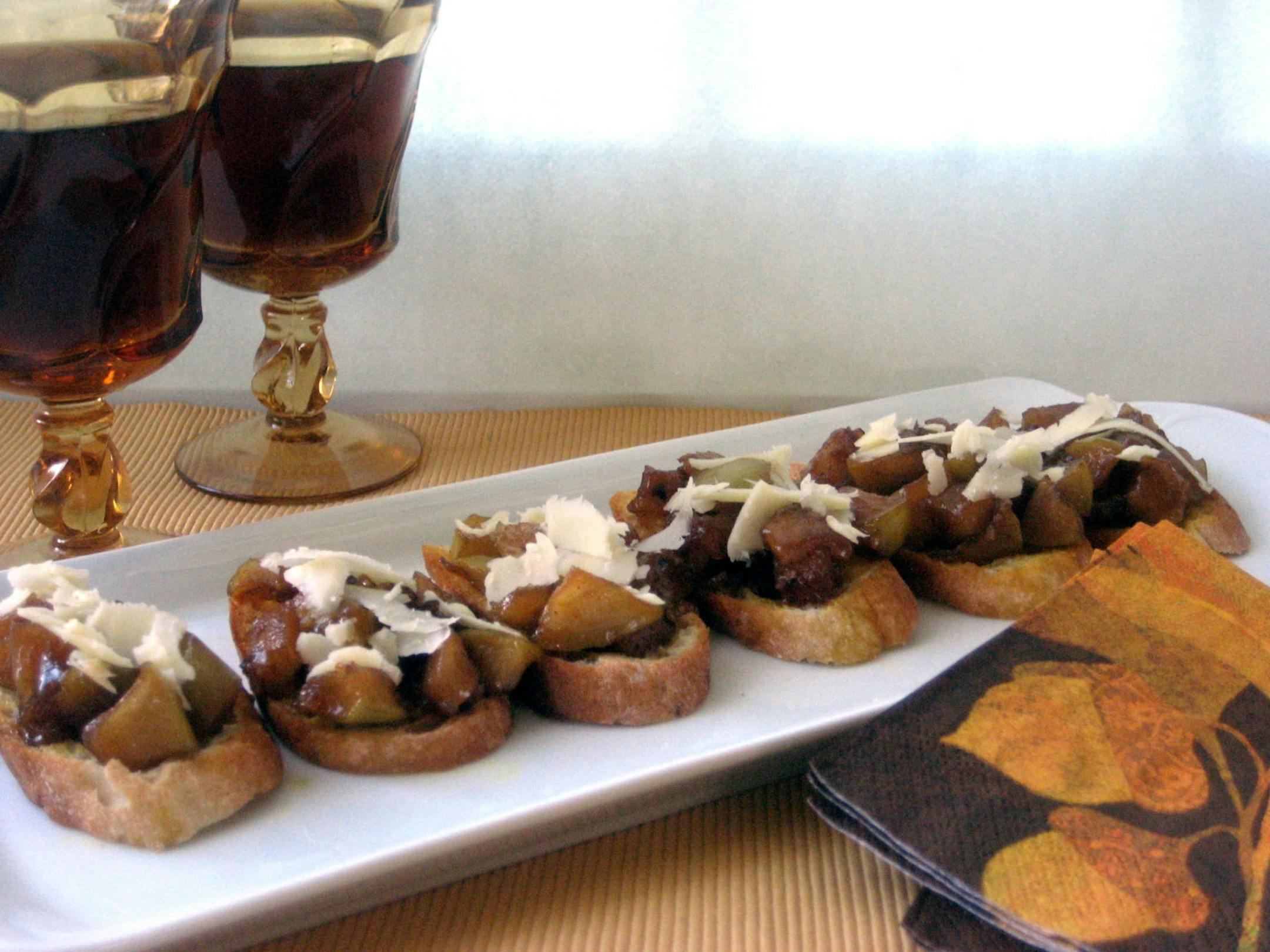 Apple chutney and shaved white Cheddary on curry toasts.