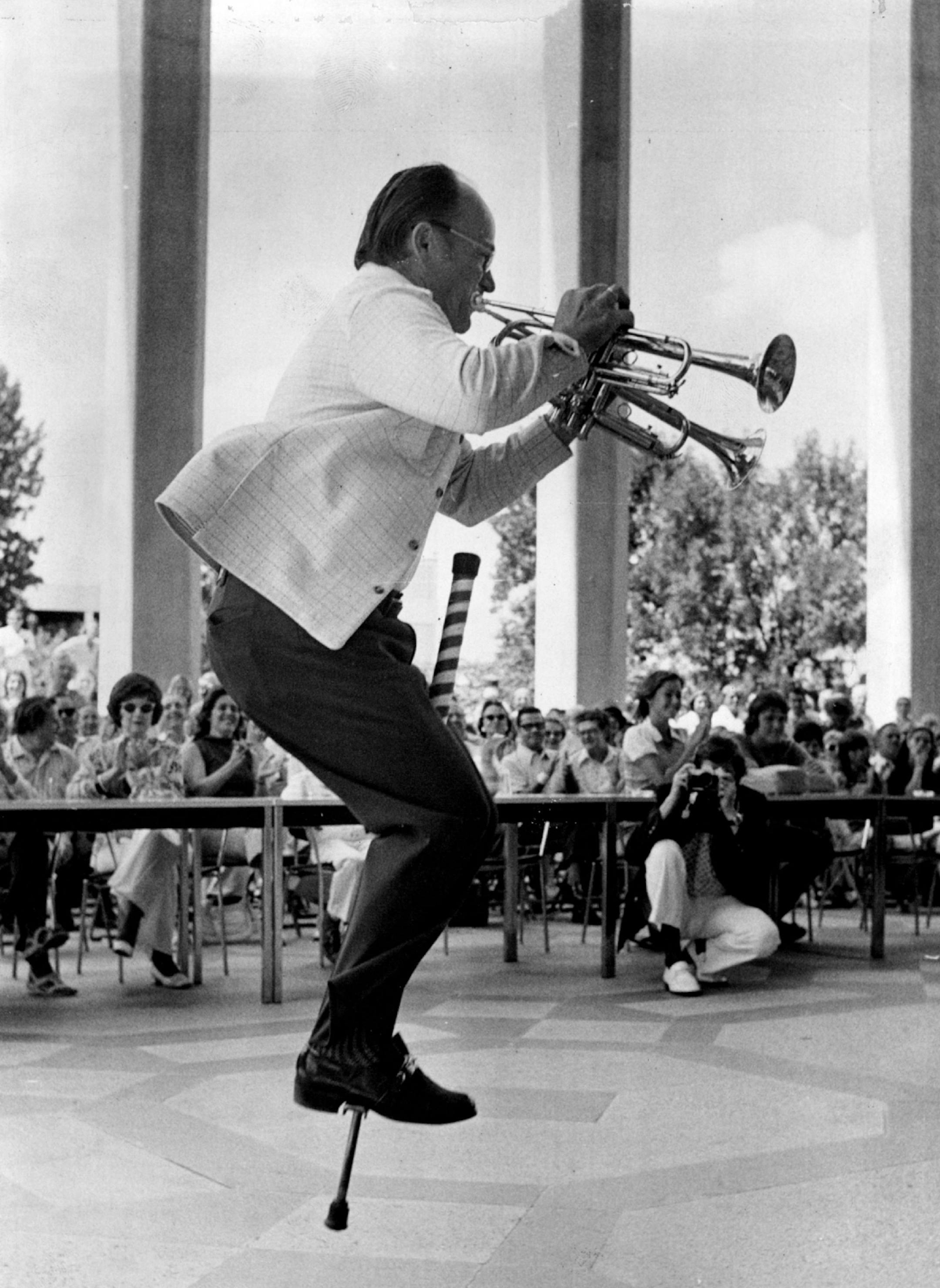 July 21, 1975: Wally Pikal, Hutchinson, who recently appeared on the Johnny Carson TV show, did his zany feat of playing two trumpets while jumping up and down on a pogo stick during the 12th annual Schweigert Band Contest at Northwestern National Life Insurance Company plaza.