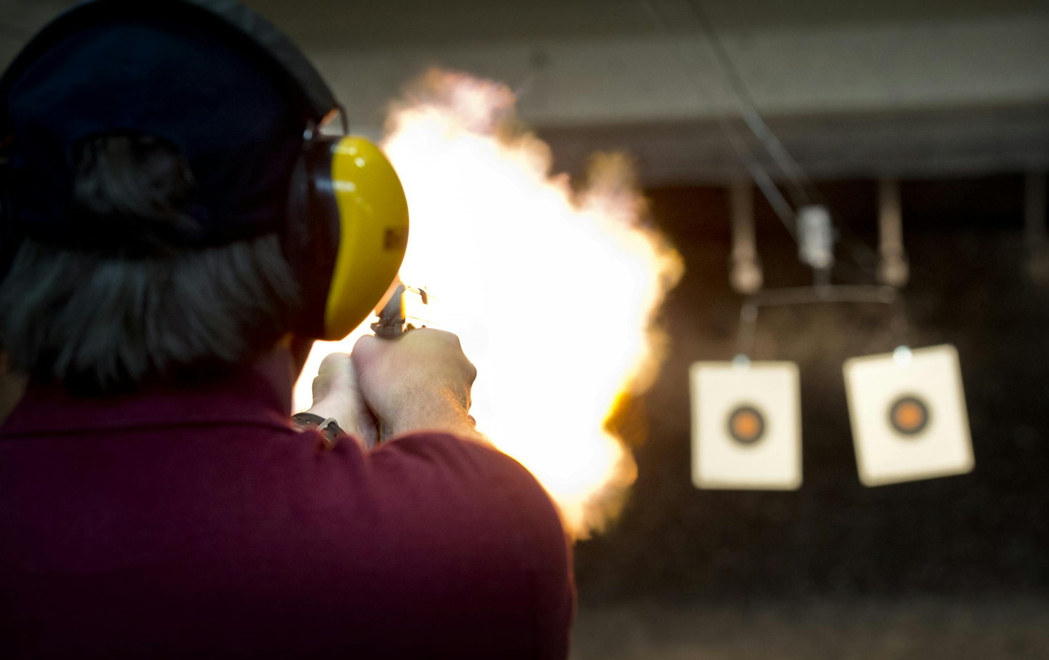 Peter Gauthier test fired a .357 at Bill's Gun Shop and Range in Robbinsdale which was busy Friday afternoon. Friday, July 19, 2013 ] GLEN STUBBE * gstubbe@startribune.com
