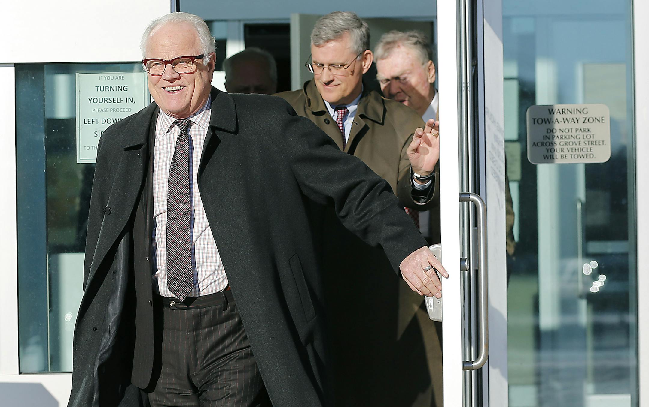 Officer Jeronimo Yanez's defense attorneys Earl Gray, left, Paul Engh, center, and Thomas Kelly, made their way out of the Ramsey County Law Enforcement Center after Yanez appeared in court Monday for killing Philando Castile, Monday, December 19, 2016 in St. Paul, MN. ] (ELIZABETH FLORES/STAR TRIBUNE) ELIZABETH FLORES • eflores@startribune.com