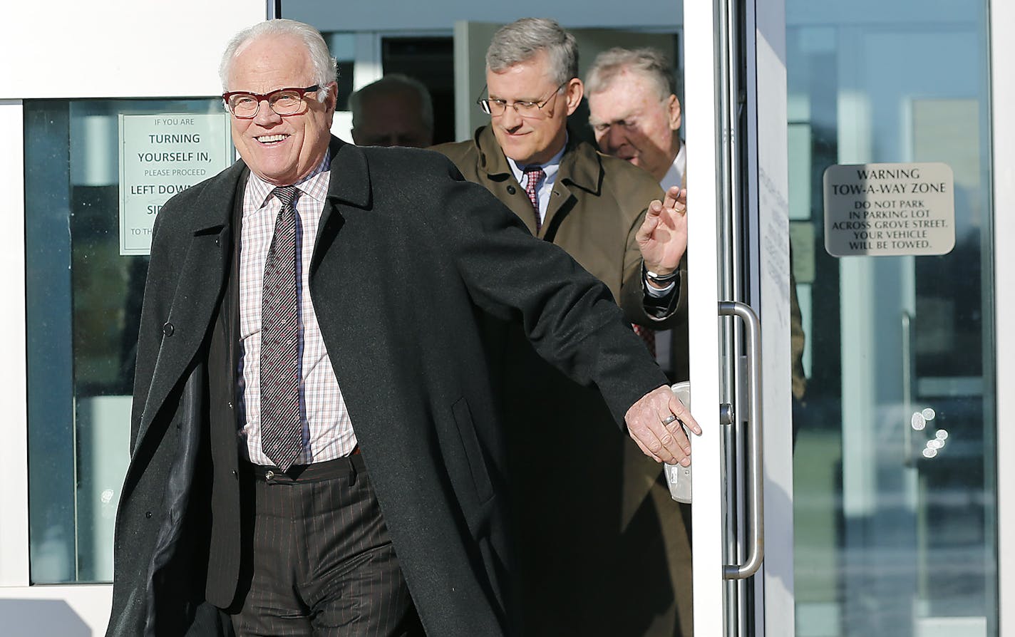 Officer Jeronimo Yanez's defense attorneys Earl Gray, left, Paul Engh, center, and Thomas Kelly, made their way out of the Ramsey County Law Enforcement Center after Yanez appeared in court Monday for killing Philando Castile, Monday, December 19, 2016 in St. Paul, MN. ] (ELIZABETH FLORES/STAR TRIBUNE) ELIZABETH FLORES &#x2022; eflores@startribune.com