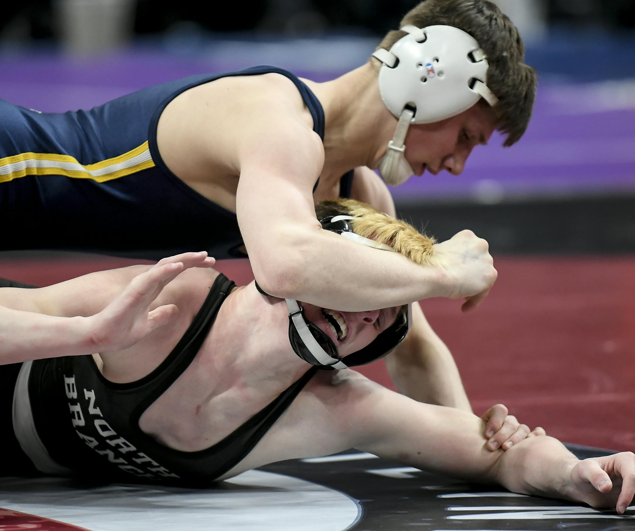Jake Svihel, of Totino Grace, wrestled Brandt Bombard, of Northbranch, in a Class 2A 126lb quarterfinal match Friday. Svihel won with a pin at 2:58. ] Aaron Lavinsky ¥ aaron.lavinsky@startribune.com The Class 3A, 2A and 1A wrestling state meet quarterfinals were held Friday, March 1, 2019 at the Xcel Energy Center in St. Paul. Minn.
