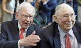 Berkshire Hathaway Chairman and CEO Warren Buffett, left, and Vice Chairman Charlie Munger, briefly chat with reporters Friday, May 3, 2019, one day before Berkshire Hathaway's annual shareholders meeting. An estimated 40,000 people are expected in town for the event, where Buffett and Munger preside over the meeting and spend hours answering questions. (AP Photo/Nati Harnik) ORG XMIT: NENH1