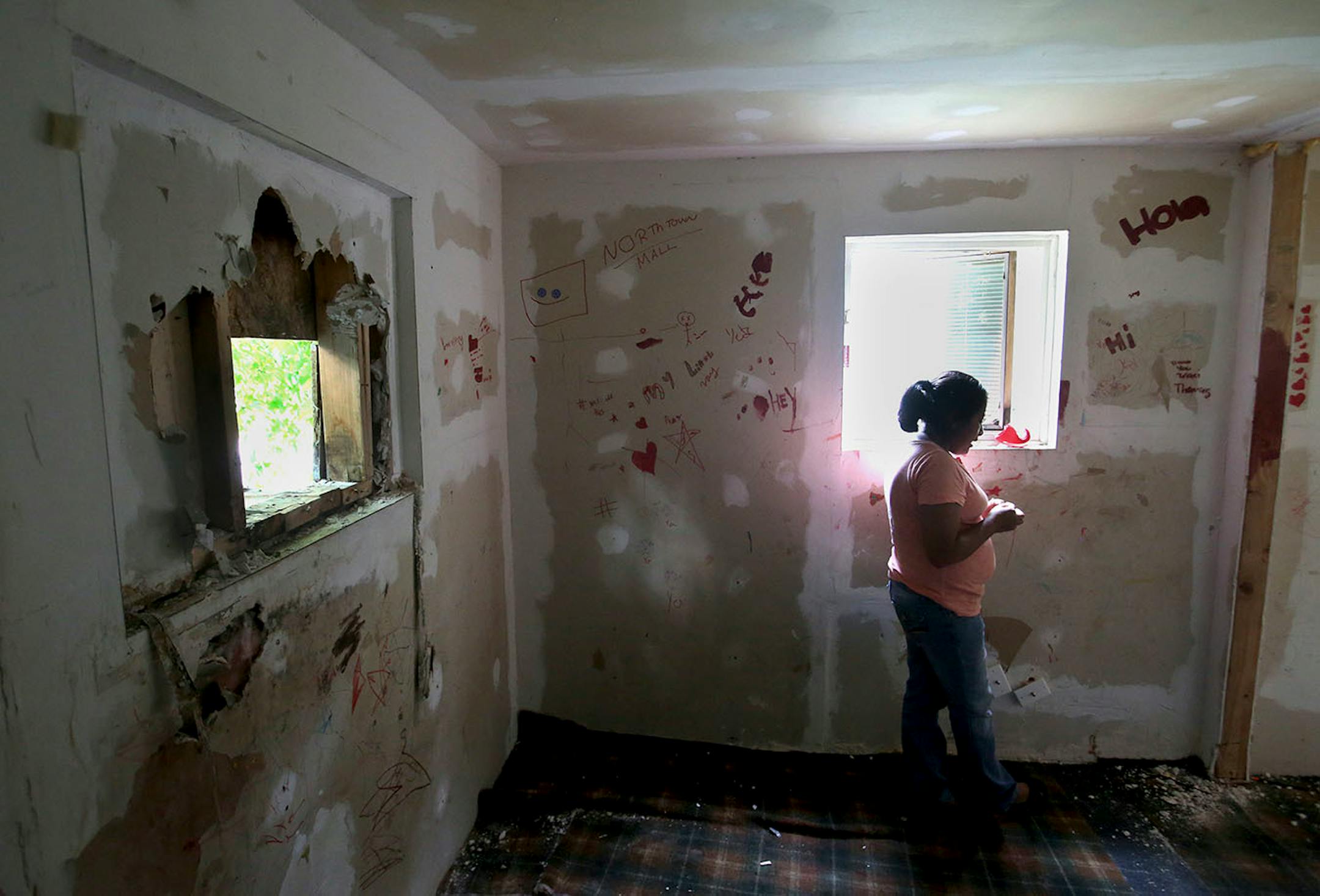 A Lowry Grove mobile home resident , who wished to not be identified, shows the inside of her home where her family stopped a remodel after finding out the park would be closing and seen Friday, June 30, 2017, in St. Anthony, MN. Lowry Grove closed it's gate and all residents had to be gone by 12 midnight the following day, the space slated to be redeveloped into multiple-family housing. Some residents didn't know where they would go and talked of being homeless and sleeping in a vehicle.