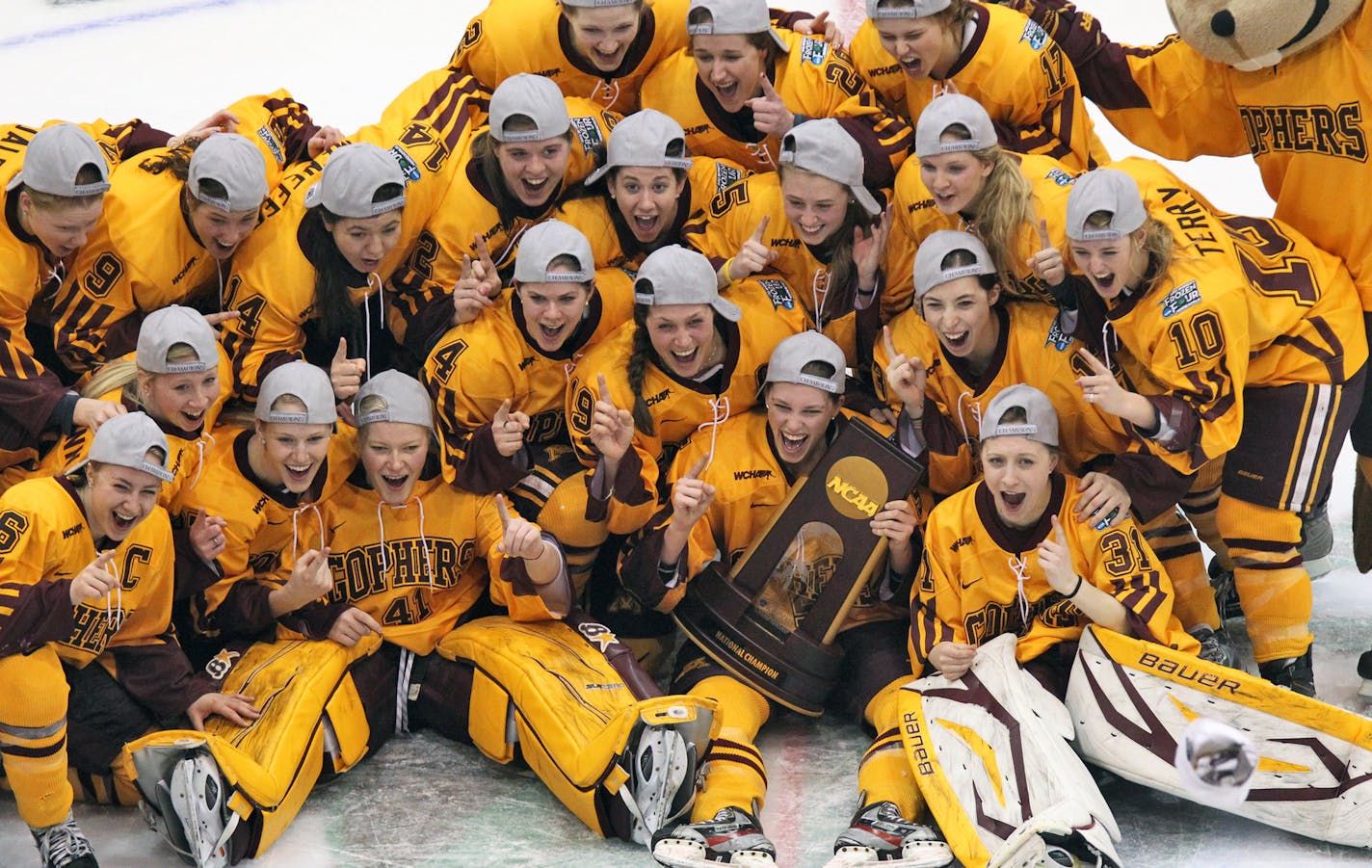 Frozen Four championship game - Minnesota Gophers vs. Boston University (BU) Terriers. Minnesota won 6-3. Gophers celebrated with their championship trophy. (MARLIN LEVISON/STARTRIBUNE(mlevison@startribune.com (cq program)