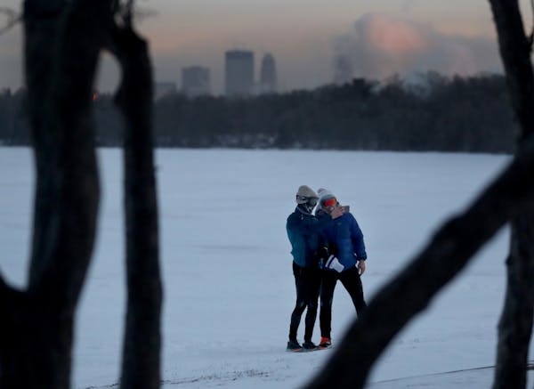 Frosty runners Matt Frantzen, left, and Zach Schendel documented their morning dash around Lake Harriet in minus-20 temps Thursday in Minneapolis.