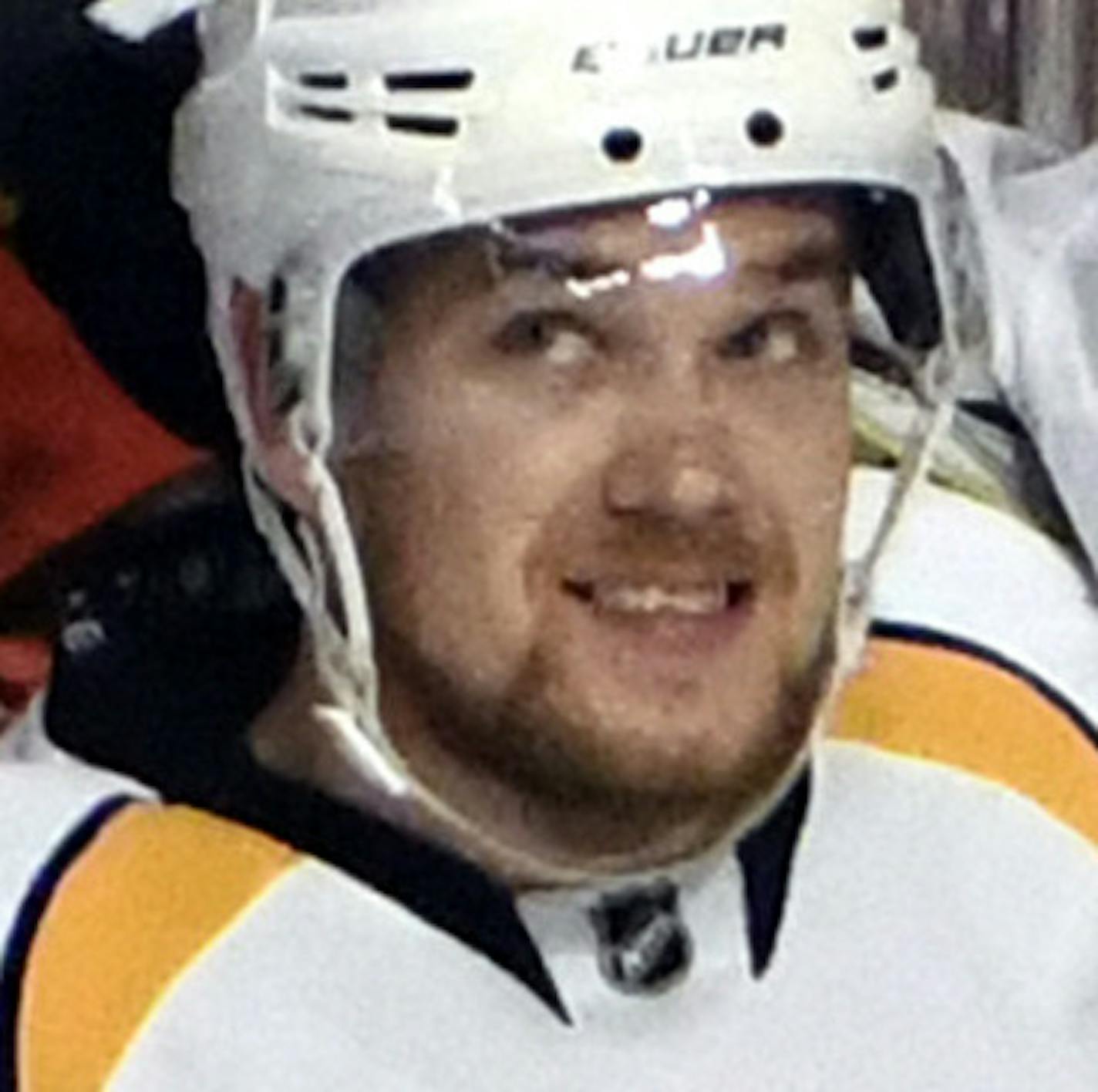 FILE - In this April 13, 2017, file photo, Nashville Predators right wing Viktor Arvidsson, center, celebrates his goal against the Chicago Blackhawks with defenseman Mattias Ekholm (14) and center Filip Forsberg during the first period in Game 1 of a first-round NHL hockey playoff series in Chicago. The Predators have six Swedes on their playoff roster, part of a growing trend that featured 79 skaters and 10 goalies from Sweden during the regular season with 40 playing in at least one game this