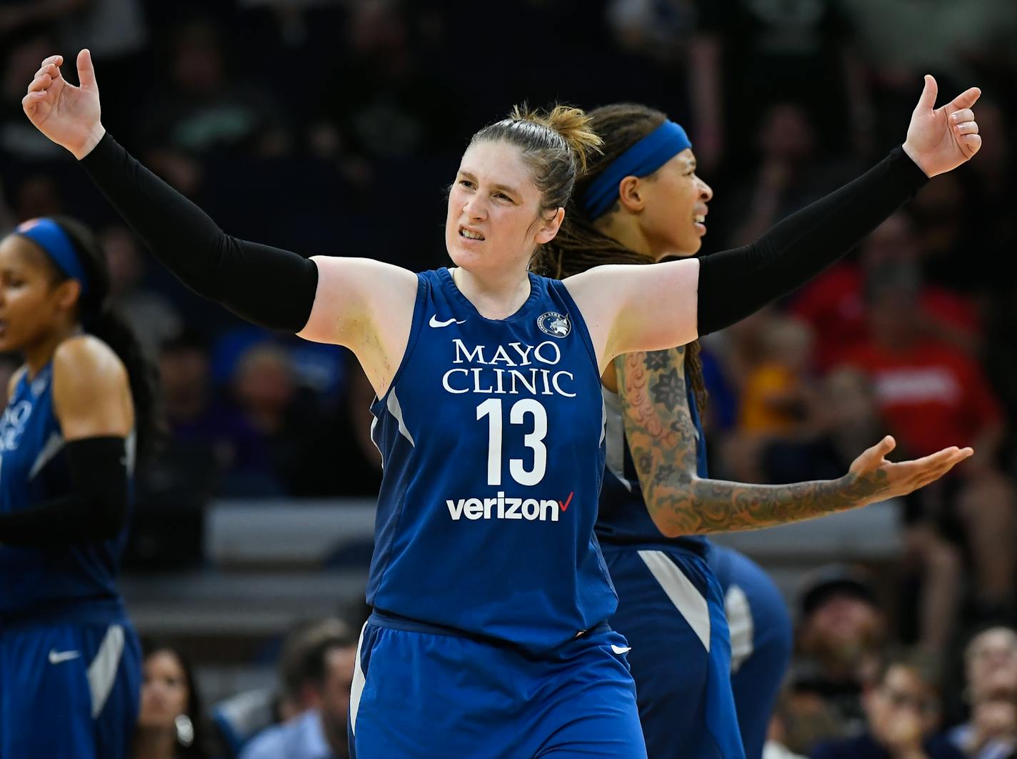 Minnesota Lynx guard Lindsay Whalen (13) tried to bring some energy into the crowd as guard Seimone Augustus (33) argued against a technical foul in the second half Friday night against the Las Vegas Aces. ] AARON LAVINSKY &#xef; aaron.lavinsky@startribune.com The Minnesota Lynx played the Las Vegas Aces on Friday, July 13, 2018 at Target Center in Minneapolis, Minn.