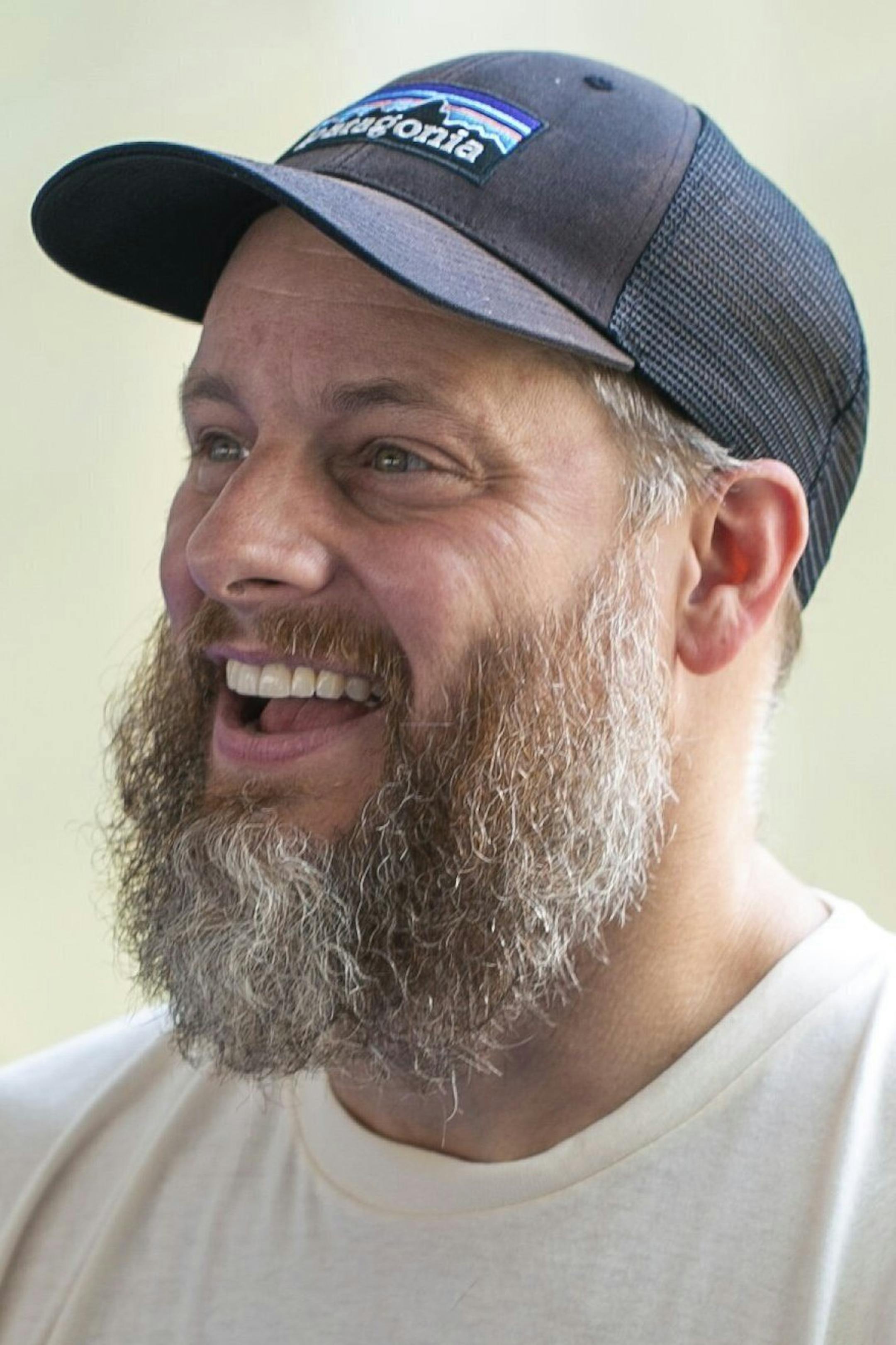 In a Sunday, July 10, 2019 photo, John Austin talks about the different opportunities and experiences that have come from being able to take phrases and reverse it. (Joshua Komer/The Charlotte Observer via AP)