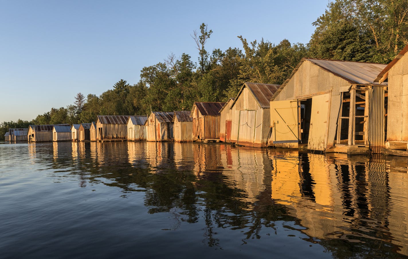 ONE TIME USE ONLY FOR FALL 2020 MAGAZINE Credit: Ryan Tischer photography The Stuntz Bay Boathouse Historic District is a row of 143 boathouses on Lake Vermillion in Breitung Township, Minn. Mining companies would give workers a lot as a reward for their years of service, and miners would construct their own houses.