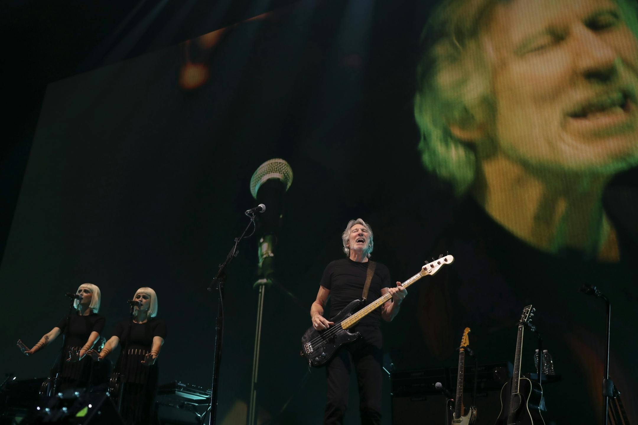 Roger Waters during "Time,", the third song in his set Wednesday night at Xcel Energy Center in St. Paul. With him were Holly Laessig, left, and Jess Wolfe of Lucius, on backup vocals