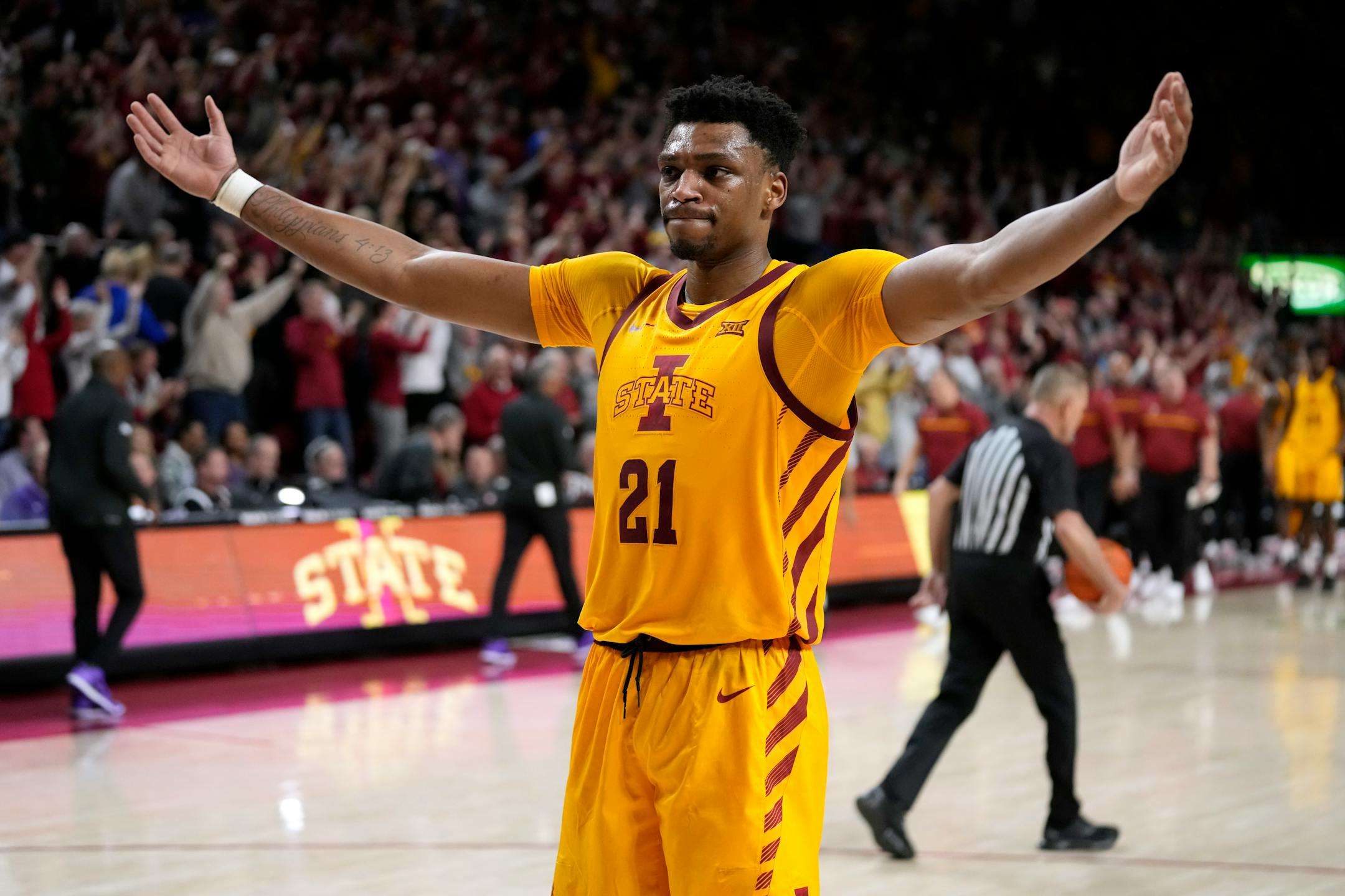 Iowa State center Osun Osunniyi celebrates at the end of Tuesday's game against Kansas State