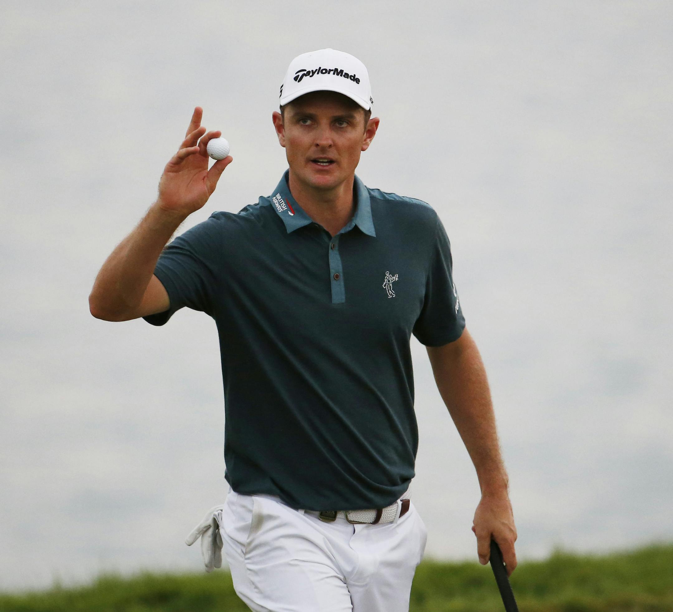 Justin Rose, of England, after a birdie on the 17th hole during the second round of the PGA Championship golf tournament Friday, Aug. 14, 2015, at Whistling Straits in Haven, Wis. (AP Photo/Julio Cortez)