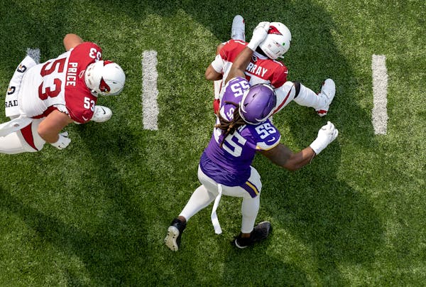 Kyler Murray (1) of the cardinals is sacked by  is sacked by Za’Darius Smith (55) of the Vikings during the second quarter on Sunday.