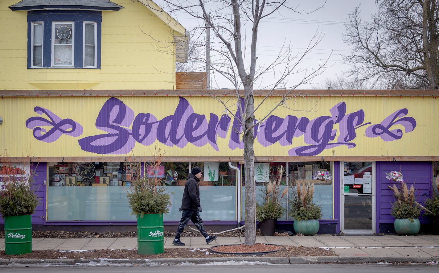 A written closed sign is one of many signs on the door at Soderberg Floral and Gifts in Minneapolis, Minn., on Friday, Jan. 5, 2024. After 99 and a half years on Lake Street, Soderberg Floral and Gifts abruptly shut this week, ending a lynchpin for the Long Fellow neighborhood. ] Elizabeth Flores • liz.flores@startribune.com