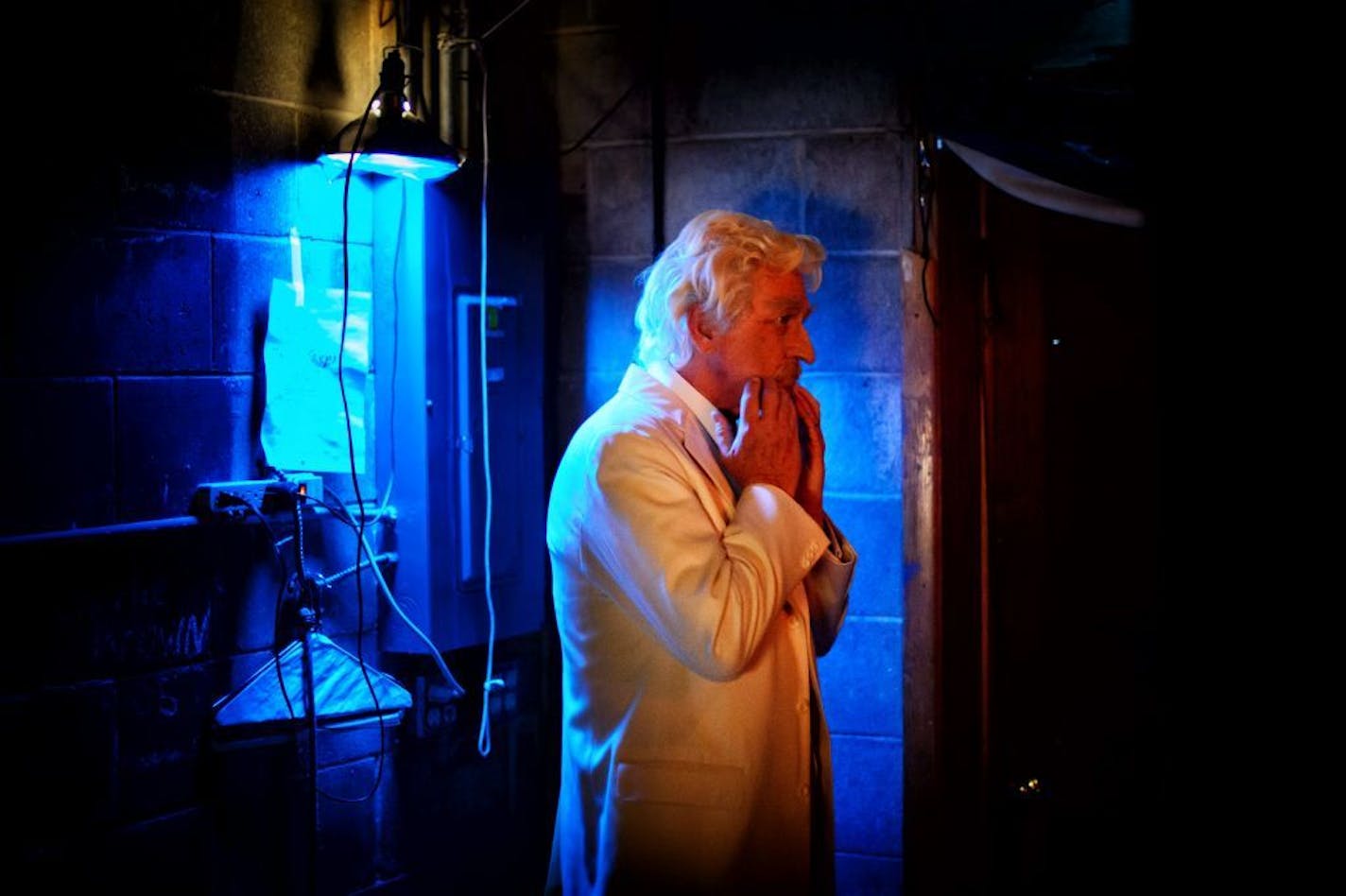 Don Shelby as Mark Twain checked the glue that holds his beard, mustache and eyebrows minutes before the show began.