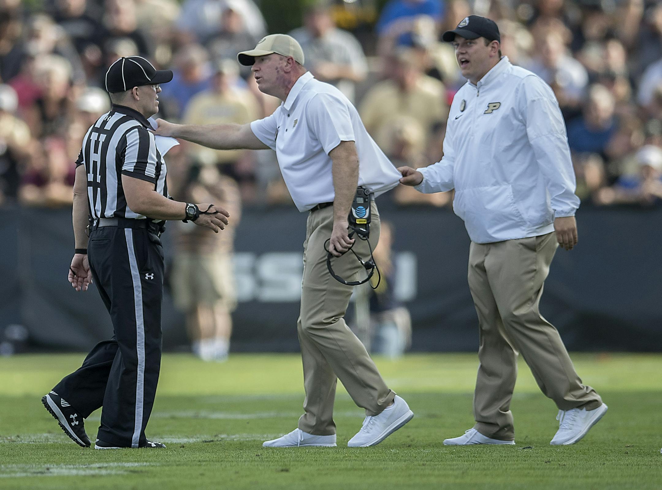 Purdue's Head Coach Jeff Brohm argued a call with the referees during the second quarter the Gophers took on Purdue at Ross-Ade Stadium, Saturday, October 7, 2017 in West Lafayette, IN.