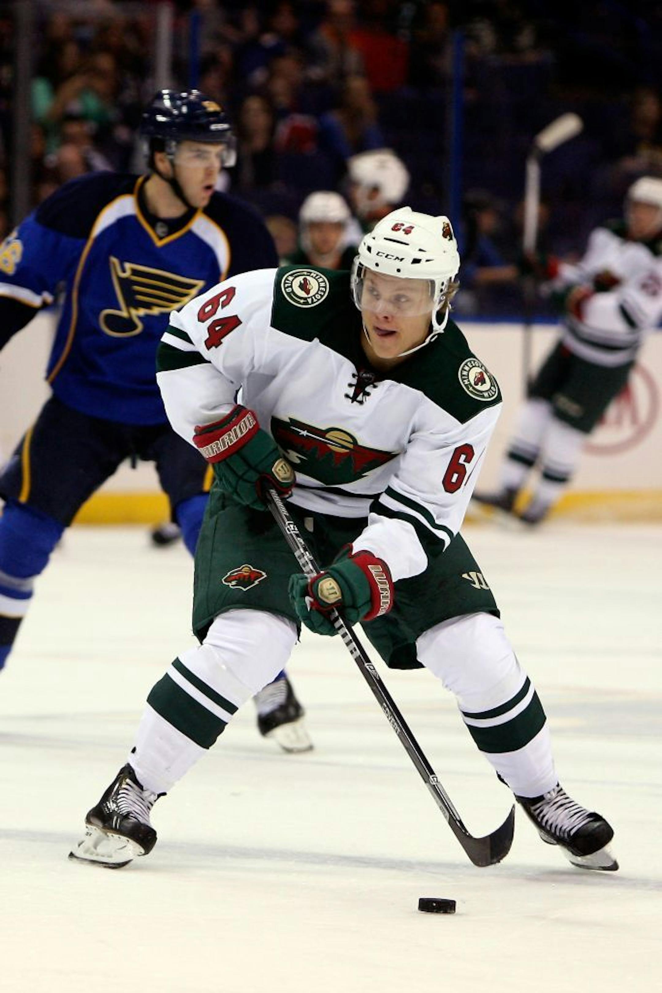 Minnesota Wild's Mikael Granlund, of Finland, looks to pass the puck during the first period of a preseason NHL hockey game against the St. Louis Blues Friday, Sept. 27, 2013, in St. Louis.