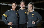 U of M volleyball team leaders (L to R) Alexis Hart , Molly Lohman, and Samantha Seliger-Swenson pose for portraits before practice as the team heads 