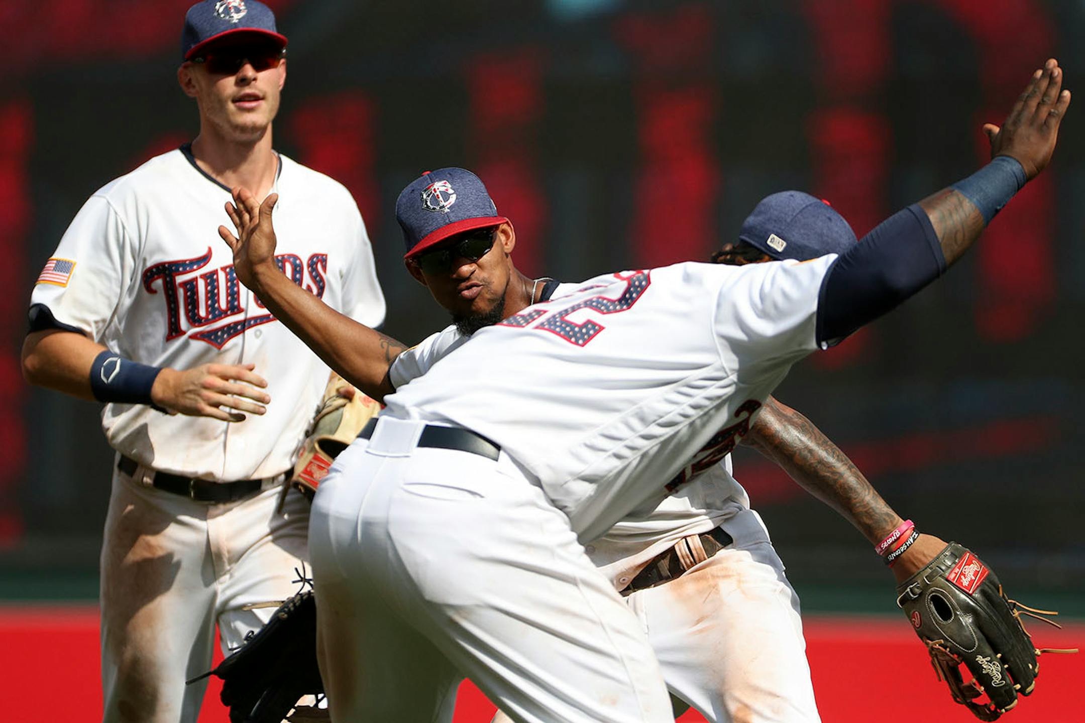 Minnesota Twins center fielder Byron Buxton (25) celebrated the win with Minnesota Twins third baseman Miguel Sano (22).