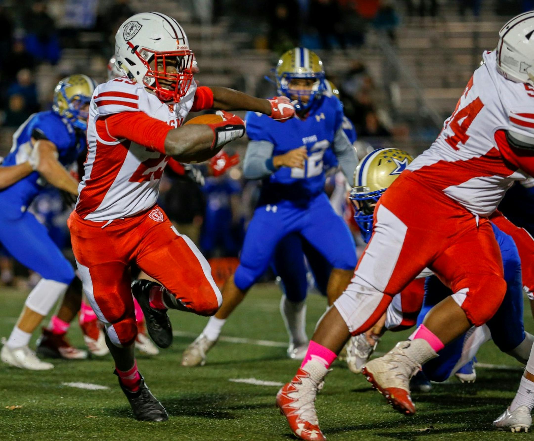 Benilde-St. Margaret's running back Isaiah Smith cuts to the sideline on a first half rush against Holy Angels. The Red Knights and Stars were tied 3-3 at halftime. Photo by Jeff Lawler, SportsEngine