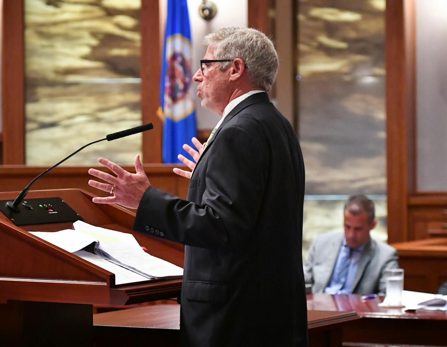 Charles Nauen, the city's attorney on the wage case spoke before the Minnesota Supreme Court. On the right is Bruce Nestor, the attorney representing the wage-hike supporters. ] GLEN STUBBE * gstubbe@startribune.com Tuesday, August 30, 2016 The Minnesota Supreme Court heard arguments in two high-profile citizen proposals angling to get on the Minneapolis ballot this November. One that would boost the city's minimum wage to $15 per hour and another that would require police officers to carry prof