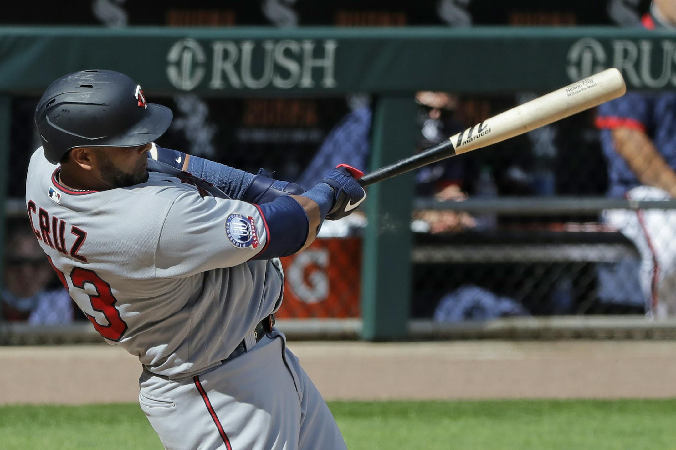 Minnesota Twins' Nelson Cruz hits a three-run home run against the Chicago White Sox during the eighth inning of a baseball game in Chicago, Sunday, July 26, 2020. (AP Photo/Nam Y. Huh)